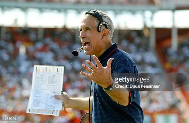 Head coach Paul Pasqualoni of the Syracuse Orangemen voices his opinion about a face masking call against his team as the Miami Hurricanes defeated...