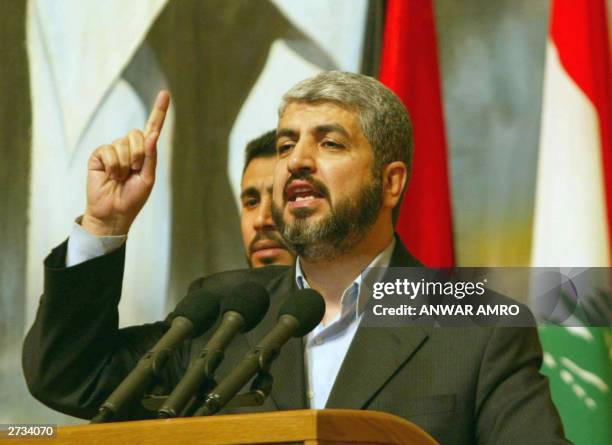 Hamas political leader Khaled Mashaal delivers a speech 16 November 2003 during a ceremony in Beirut to mark 33 years since deceased al-Assad swept...