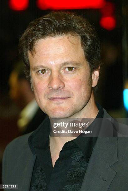 Actor Colin Firth attends the UK charity film premiere of "Love Actually" at The Odeon Leicester Square on November 16, 2003 in London.