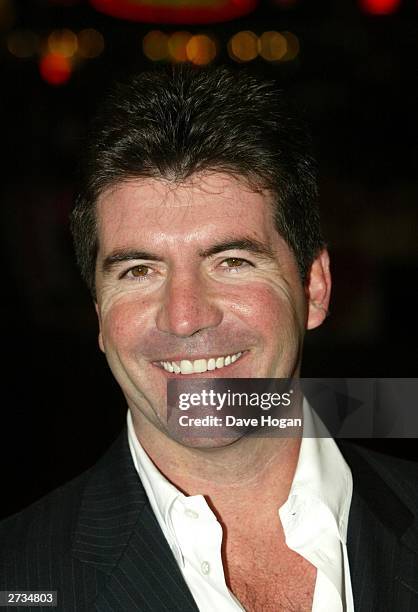 Simon Cowell attends the UK charity film premiere of "Love Actually" at The Odeon Leicester Square on November 16, 2003 in London.