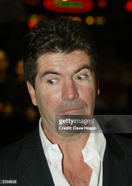 Simon Cowell attends the UK charity film premiere of "Love Actually" at The Odeon Leicester Square on November 16, 2003 in London.