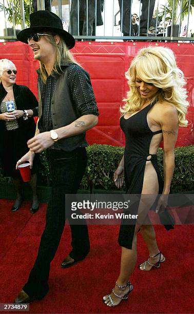 Singer Kid Rock and actress Pamela Anderson attend the 31st Annual American Music Awards at The Shrine Auditorium November 16, 2003 in Los Angeles,...