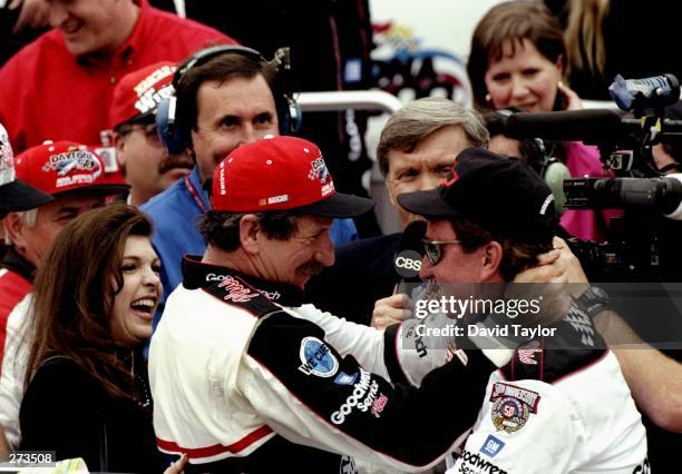 Dale Earnhardt Sr. Driver of the GM Goodwrench Chevrolet and team owner Ray Childress celebrate victory after the Nascar Daytona 500 on February 15,...