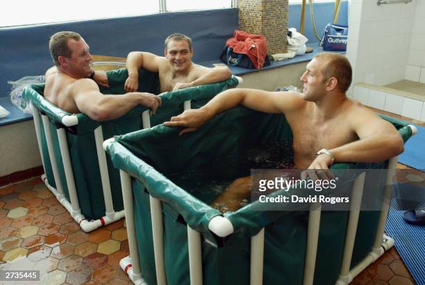 Richard Hill, Trevor Woodman and Ben Kay of England take part in a recovery session held at Harbord Diggers Pool on November 17, 2003 in Manly,...