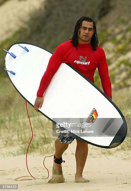 George Smith walks the beach during the Australian Wallabies surfing session at Diggers Beach November 17, 2003 in Coffs Harbour, Australia.