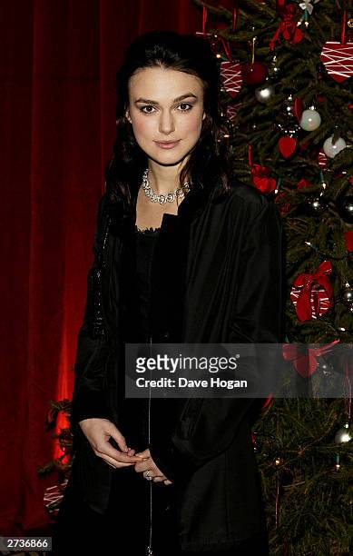 Actress Keira Knightley attends the aftershow party for the Love Actually film premiere at the IN and Out Club on November 16, 2003 in London.