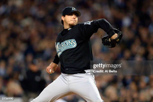 Starting pitcher Josh Beckett of the Florida Marlins pitches during game six of the Major League Baseball World Series against the New York Yankees...