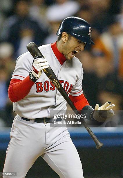 Nomar Garciaparra of the Boston Red Sox reacts after striking out in the seventh inning against the New York Yankees during game 7 of the American...