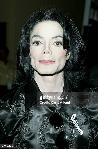 Singer Michael Jackson poses backstage at the 2003 Radio Music Awards at the Aladdin Casino Resort October 27, 2003 in Las Vegas, Nevada. Police...