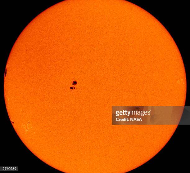In this handout photo provided by NASA, an MDI image shows giant sunspots 486 and 488, which caused intense space weather last month, and have been...
