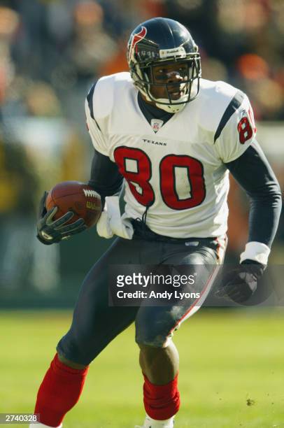 Wide receiver Andre Johnson of the Houston Texans carries the ball during the game against the Cincinnati Bengals at Paul Brown Stadium on November...