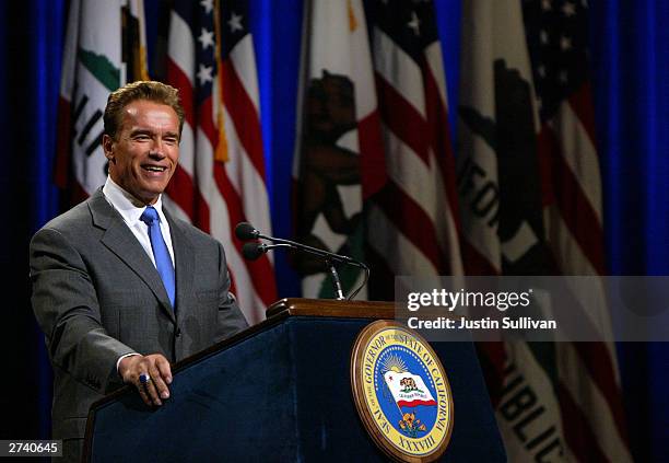 California Governor Arnold Schwarzenegger speaks to reporters during his first news conference as governor November 18, 2003 in Sacramento,...