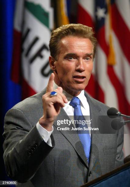 California Governor Arnold Schwarzenegger speaks to reporters during his first news conference as governor November 18, 2003 in Sacramento,...