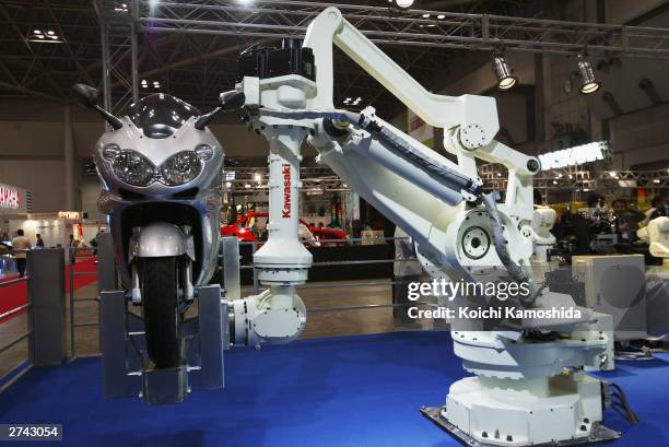 Kawasaki Heavy Industries Ltd display their MX500 robot at the 2003 International Robot Exhibition on November 19, in Tokyo, Japan.