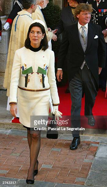 Princess Caroline Casiraghi with Prince Ernst August of Hanover leave the cathedral during the Principality National Day parade November 19, 2003 in...