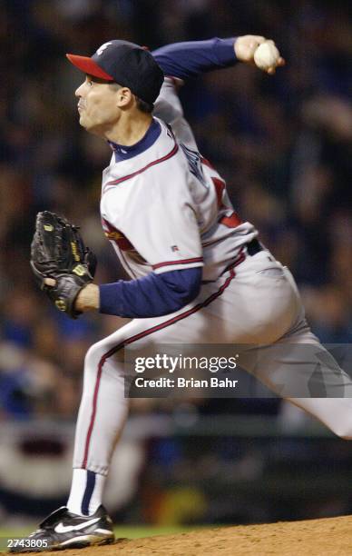 Greg Maddux of the Atlanta Braves throws against the Chicago Cubs during game three of the National League Division Series on October 3, 2003 at...
