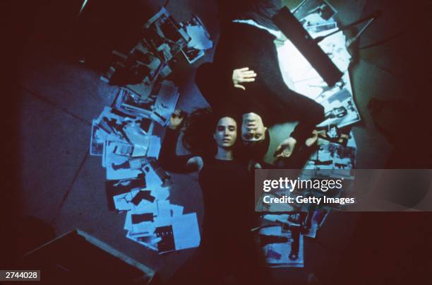 Actors Jared Leto and Jennifer Connelly lie on the floor in a scene from the film, 'Requiem for a Dream,' directed by Darren Aronovsky, 2000.