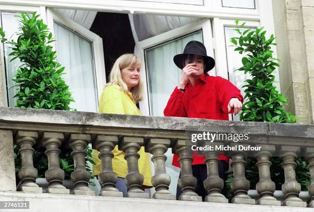 Singer Michael Jackson and his wife Debbie Rowe greet fans from the balcony of the hotel Royal Monceau in Paris 1997. Santa Barbara County Sheriff's...