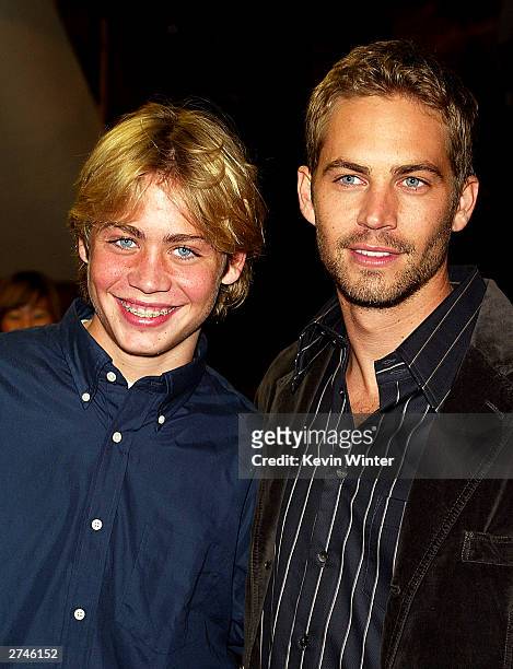 Actor Paul Walker and his brother Cody arrive at the premiere of "Timeline" at the National Theatre on November 19, 2003 in Los Angeles, California.