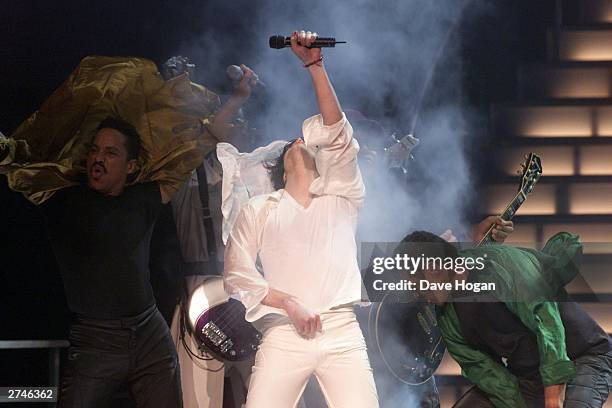 Music star Michael Jackson sings with his brothers the Jackson 5 at the 30th anniversary celebrations held on September 10, 2001 at Madison Square...