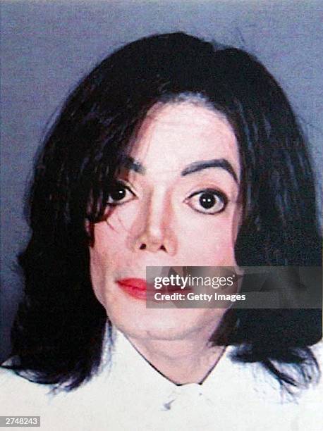 In this handout image provided by the Santa Barbara County Sheriff's Office, Singer Michael Jackson is shown in a mug shot after he was booked on...
