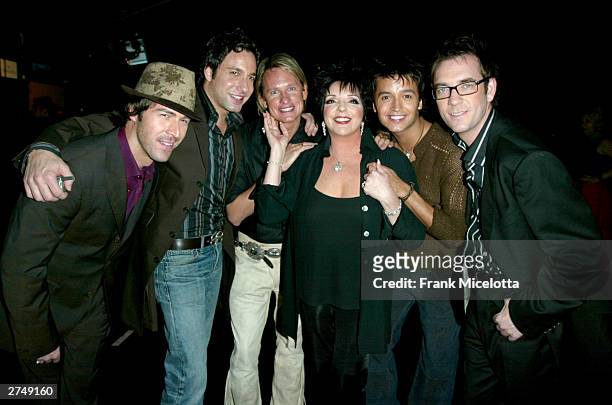 Singer Liza Minnelli poses backstage with members of "Queer Eye for the Straight Guy" at VH1's Big In 2003 Awards on November 20, 2003 at Universal...