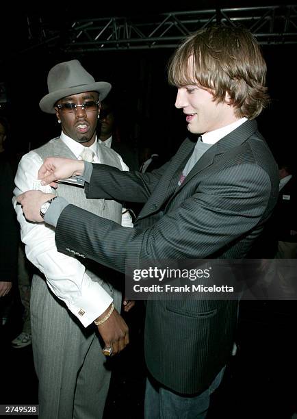 Rapper Sean "P Diddy" Combs and actor Ashton Kutcher pose backstage at VH1's Big In 2003 Awards on November 20, 2003 at Universal City in Los...