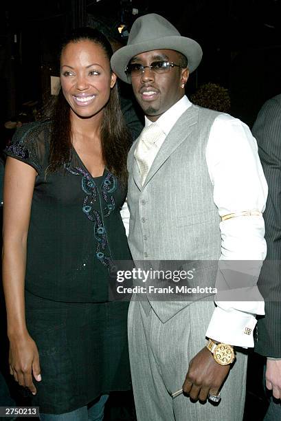 Actress Aisha Tyler and rapper Sean "P Diddy" Combs pose backstage at VH1's Big In 2003 Awards on November 20, 2003 at Universal City in Los Angeles,...