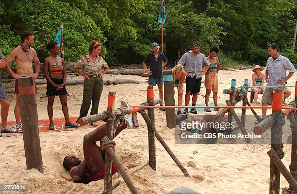 The Morgan tribe and the Drake Tribe compete in the Immunity Challenge as host Jeff Probst observes on the television series, 'Survivor:Pearl...