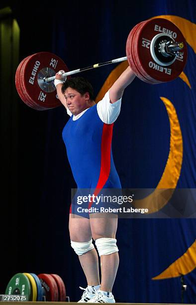 Meiyuan Ding of China lifts 135.5 Kilograms to set a world record in the Snatch before breaking it again with a lift of 137.5 Kilograms during the...