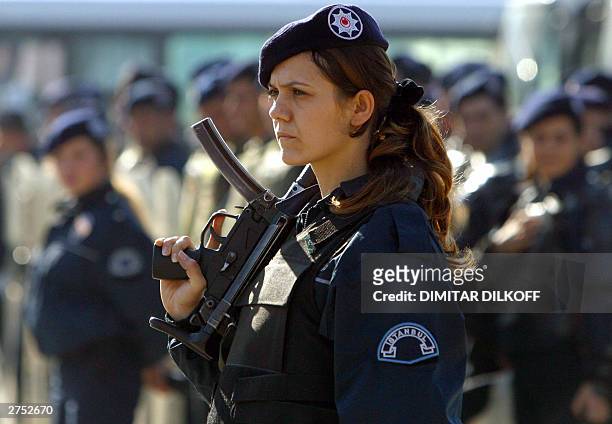 A woman police officer watches a demonstration called by left wing... News  Photo - Getty Images