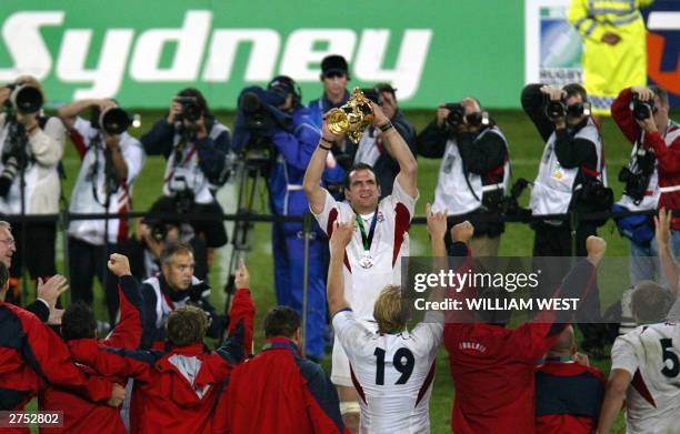 English captain and lock Martin Johnson lifts the William Webb Ellis Cup after winning the Rugby World Cup 2003 final between Australia and England...