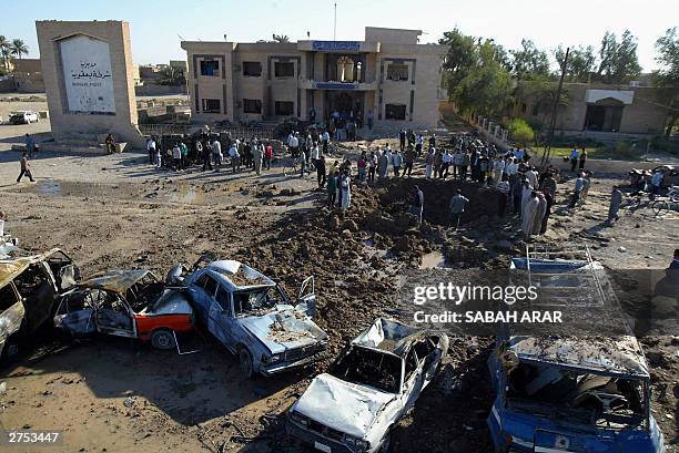 General view of the crater caused by the explosion of a bomb attack outside the police station of Baquba, 22 November 2003, 60 kms north of Baghdad....