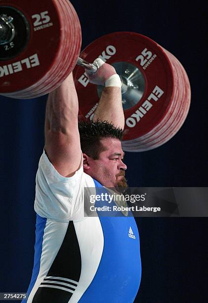 Shane Hamman of the USA lifts 230 Kilograms in the Clean and Jerk competition during the Men's +105 KG Group A Final competition at the 2003 World...