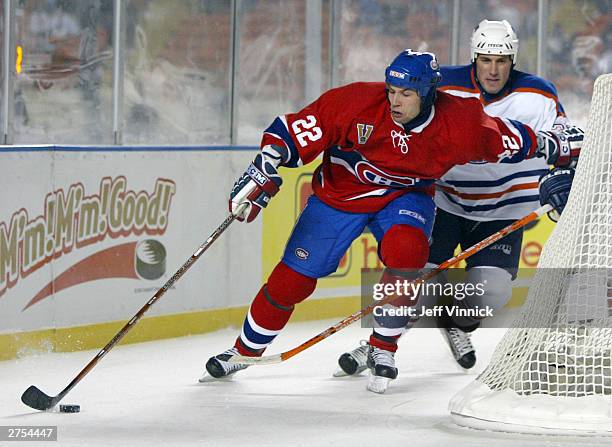 Steve Begin of the Montreal Canadiens brings the puck around the back of the net against the Edmonton Oilers during the Molson Canadien Heritage...