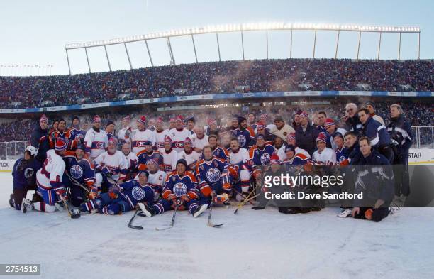 The Montreal Canadiens and and the Edmonton Oilers pose for a group photo after the Molson Canadien Heritage Classic Megastars Game on November 22,...