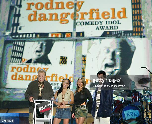 Winner for "Comedy Idol" Award winner Rodney Dangerfield with The Juggies and comedian Adam Sandler speak on stage during Comedy Central's First Ever...