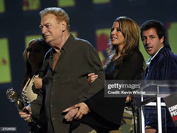 Winner for "Comedy Idol" Award winner Rodney Dangerfield with The Juggies and comedian Adam Sandler leaves the stage during Comedy Central's First...