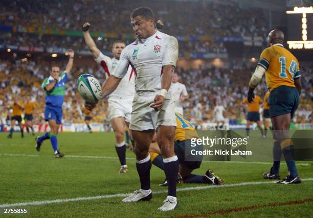 Jason Robinson of England celebrates scoring a try during the Rugby World Cup Final match between Australia and England at Telstra Stadium November...