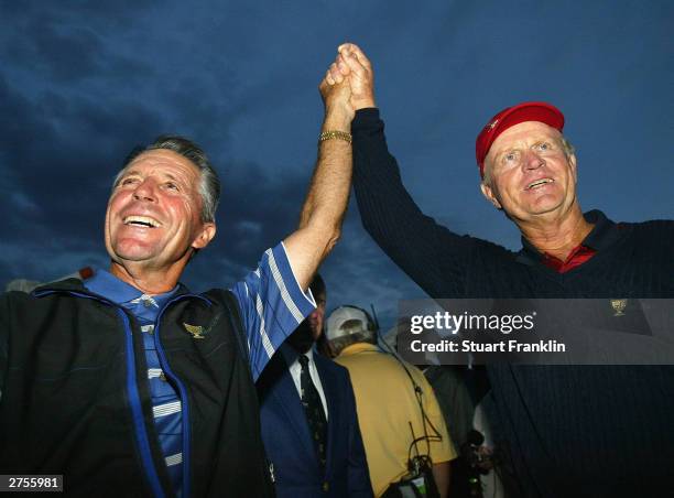 Gary Player, Captain of The International team and Jack Nicklaus, Captain of the USA team after they agree to share The Presidents Cup between USA...