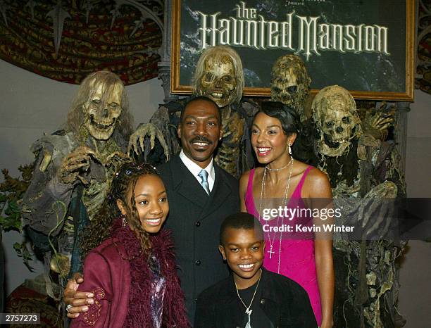Cast members Eddie Murphy, Marsha Thomason, Aree Davis and Marc John Jeffries pose at the premiere of "The Haunted Mansion" held on November 23, 2003...