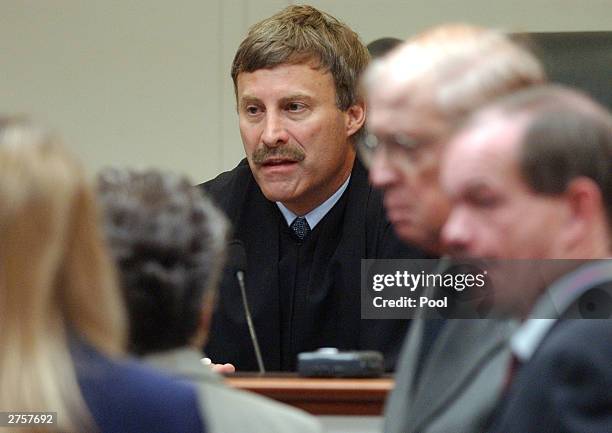 Prince William County Circuit Court judge LeRoy Millett Jr., speaks to attorneys in courtroom 10 at the Virginia Beach Circuit Court November 24,...