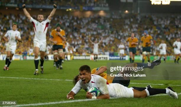 Jason Robinson of England scores a try during the Rugby World Cup Final match between Australia and England at Telstra Stadium November 22, 2003 in...