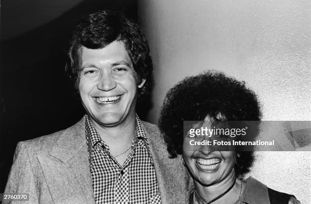 American television host David Letterman poses with Carol Morra during a S.H.A.R.E. Party at the Hollywood Palladium, Los Angeles, California, May...