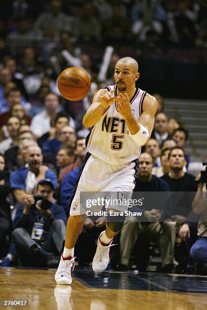 Jason Kidd of the New Jersey Nets passes the ball against the New Orleans Hornets during the game at Continental Airlines Arena on November 18, 2003...