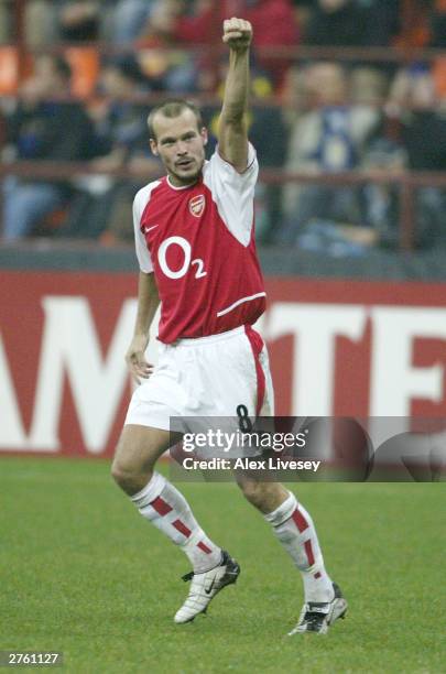 Freddie Ljungberg of Arsenal celebrates scoring their second goal during the UEFA Champions League Group B match between Inter Milan and Arsenal on...