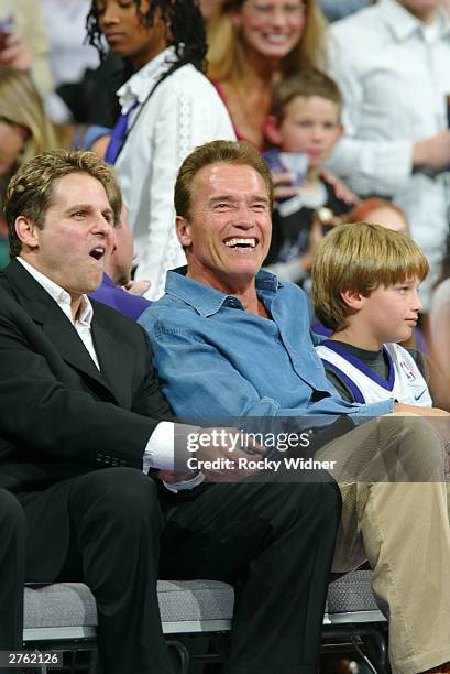 California Gov. Arnold Schwarzenegger and Sacramento Kings owner Joe Maloof sit courtside as the Kings take on the Memphis Grizzlies at Arco Arena...