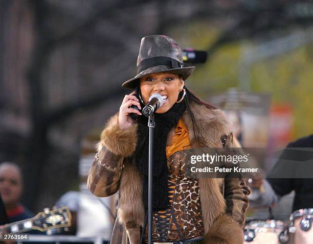 Singer Alicia Keys performs on Good Morning America in Marcus Garvey Park in Harlem to promote her new album "The Diary of Alicia Keys" on November...