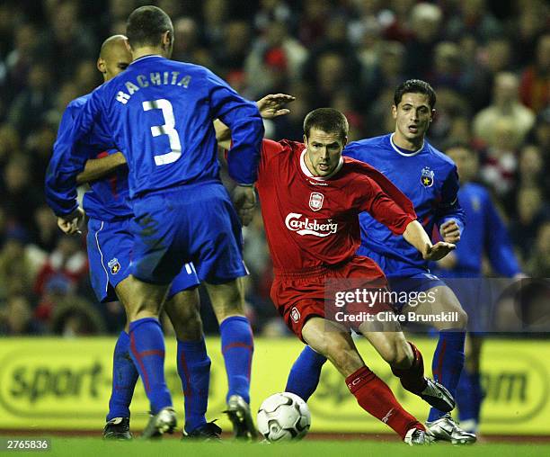 Michael Owen of Liverpool gets past Valeriu Rachita of Steaua during the UEFA Cup second round, second leg match between liverpool and Steaua...