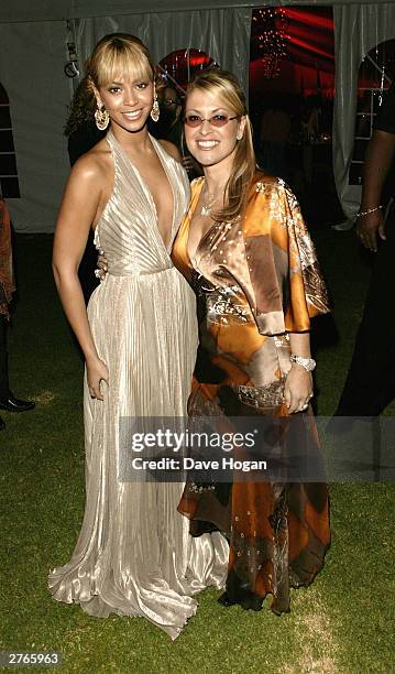 Singer Beyonce Knowles arrives at the Thanksgiving Dinner with singer Anastacia prior to the 46664 concert on November 27, 2003 in Cape Town, South...